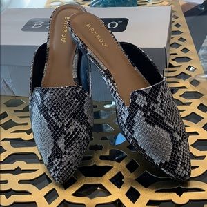 New in box, never worn, snakeskin slides. Size 8.5
